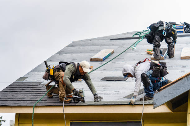 Professional Gutter Installation technician working in Sunapee, NH